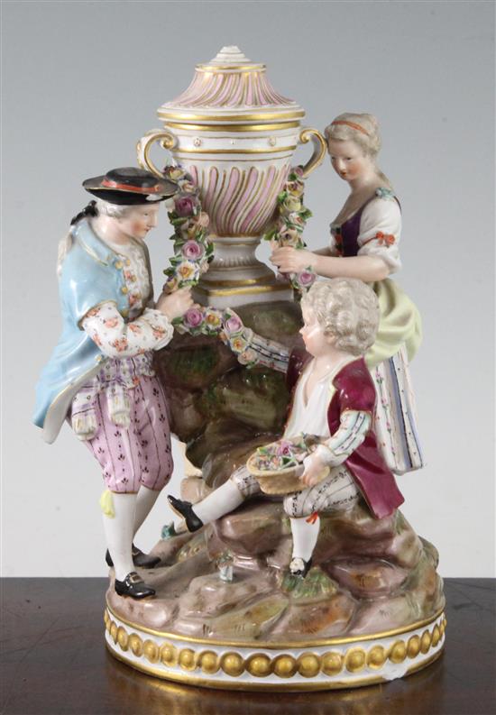 A Meissen group of three gardeners, 19th century height 21.5cm, losses